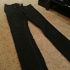 Express super stretch mid rise dark wash jeans